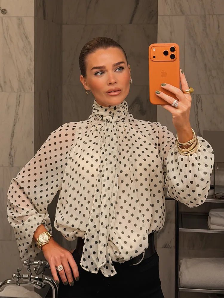 Sofia blouse a pois con collo alto