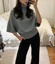 Maglione a coste con collo alto Olivia