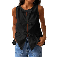 Bianca top peplum senza maniche con fiocco